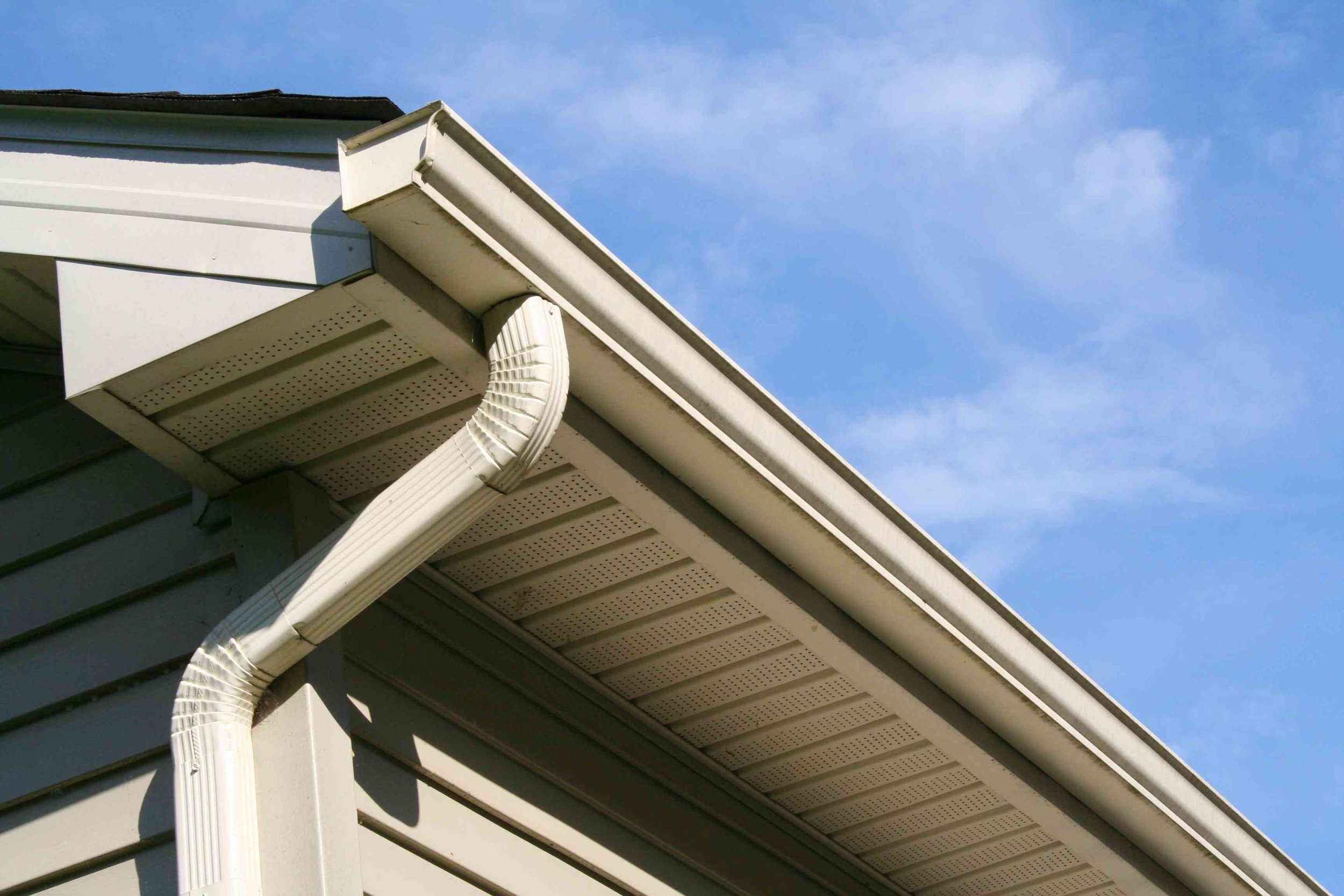 Newly installed seamless gutters, downspout and soffit